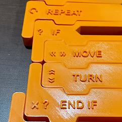 equity.webp Early prototype of orange 3D-printed blocks